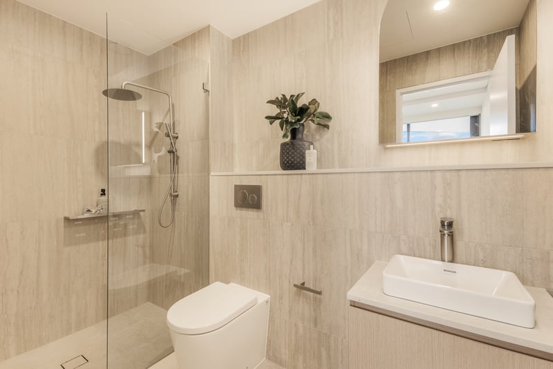 Arte Living Caringbah two bedroom main bathroom with walk-in rain shower