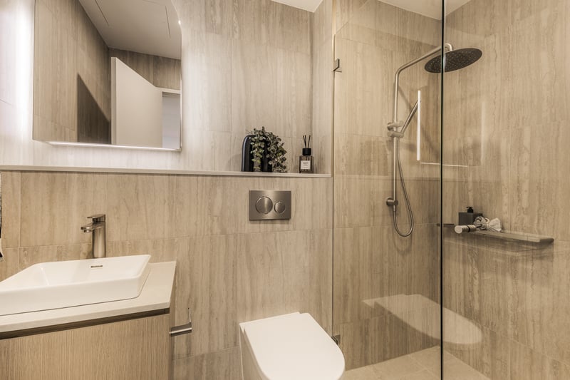 Second bathroom with rain shower and vanity in an Arte Living Caringbah two bedroom apartment